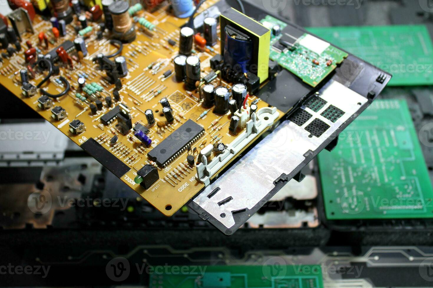Radio Board With Microchips And Components On A Stand At Workshop photo