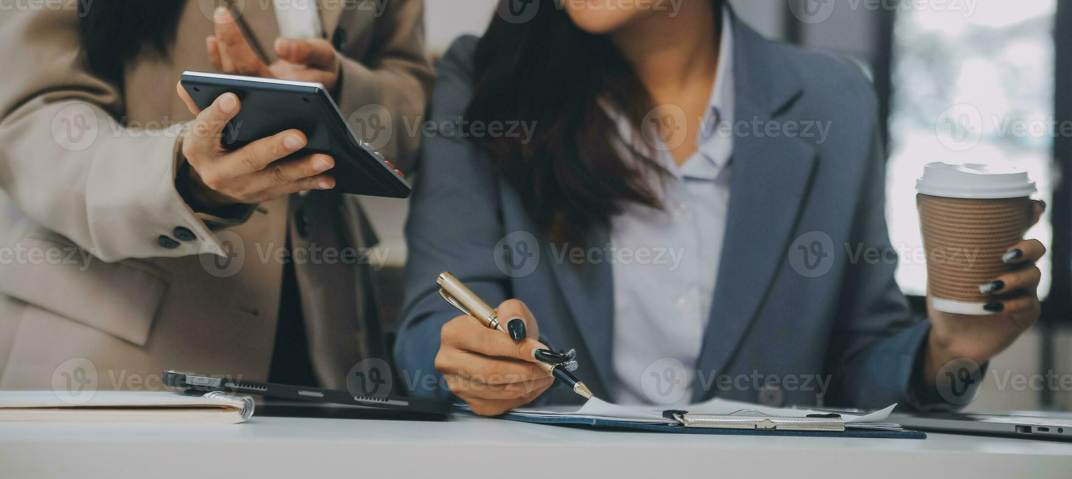 Co working conference, Business team meeting present, investor colleagues discussing new plan financial graph data on office table with laptop and digital tablet, Finance, accounting, investment. photo