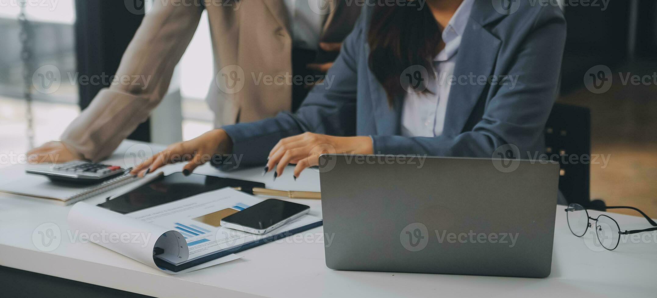 Co working conference, Business team meeting present, investor colleagues discussing new plan financial graph data on office table with laptop and digital tablet, Finance, accounting, investment. photo