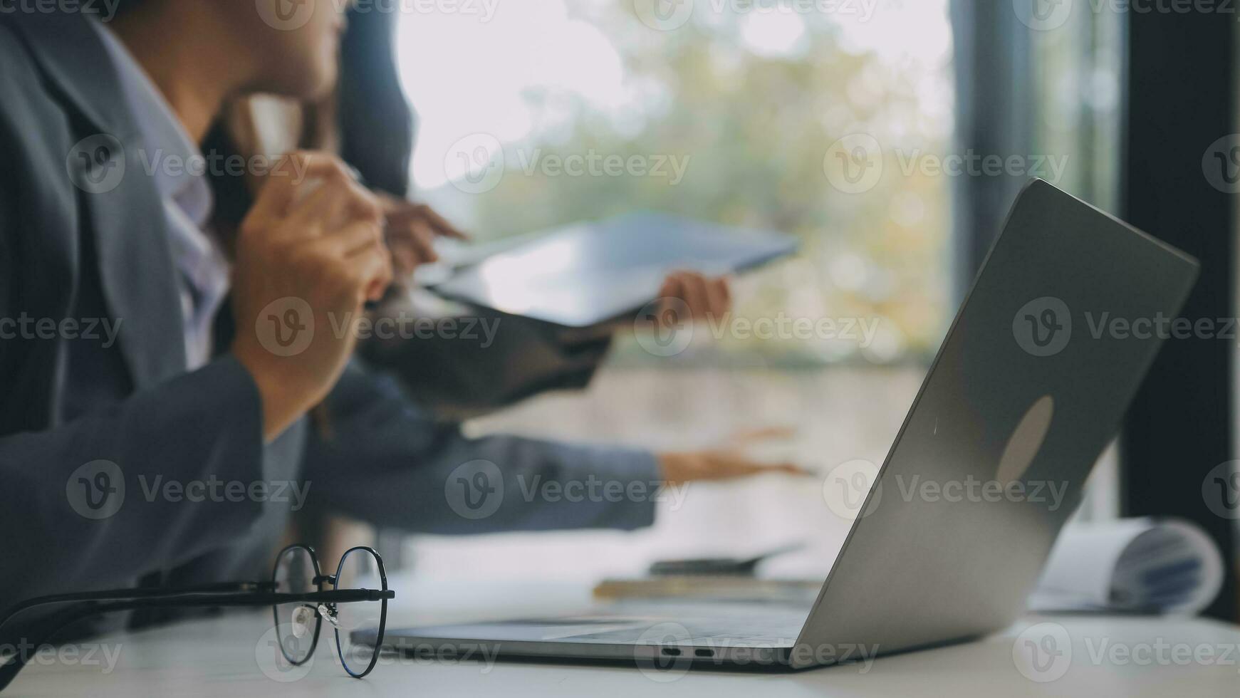 Co working conference, Business team meeting present, investor colleagues discussing new plan financial graph data on office table with laptop and digital tablet, Finance, accounting, investment. photo