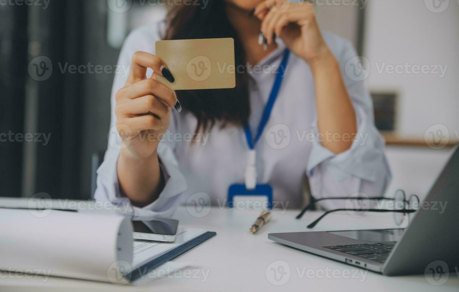 Women holding credit card and using smartphones at home.Online shopping, internet banking, store online, payment, spending money, e-commerce payment at the store, credit card, concept photo