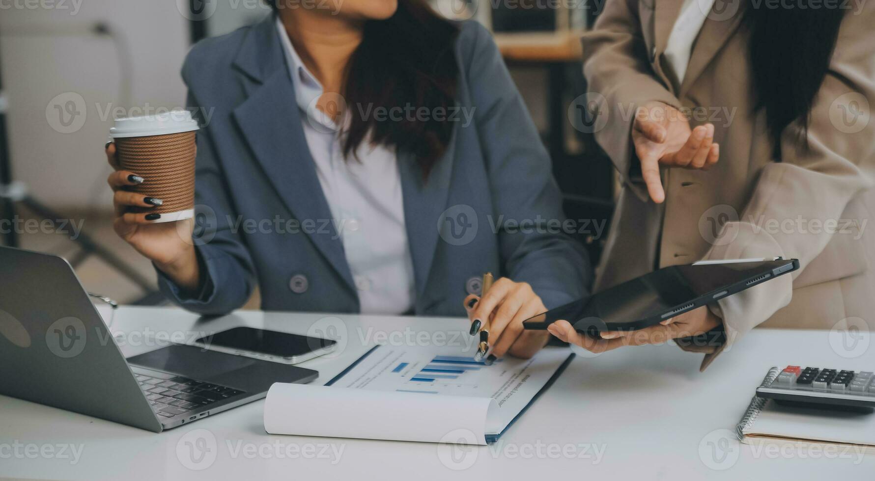 Co working conference, Business team meeting present, investor colleagues discussing new plan financial graph data on office table with laptop and digital tablet, Finance, accounting, investment. photo