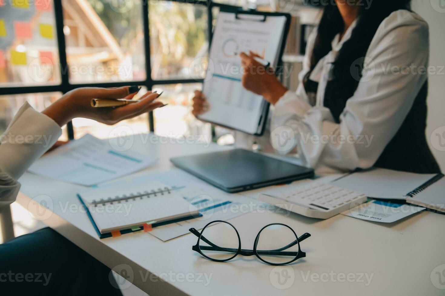 Business team collaboration discussing working analyzing with financial data and marketing growth report graph in team, presentation and brainstorming to strategy planning making profit of company. photo