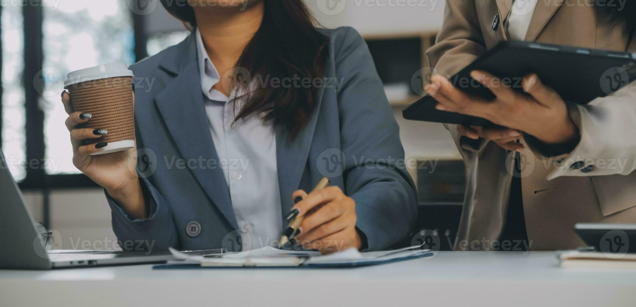 Co working conference, Business team meeting present, investor colleagues discussing new plan financial graph data on office table with laptop and digital tablet, Finance, accounting, investment. photo