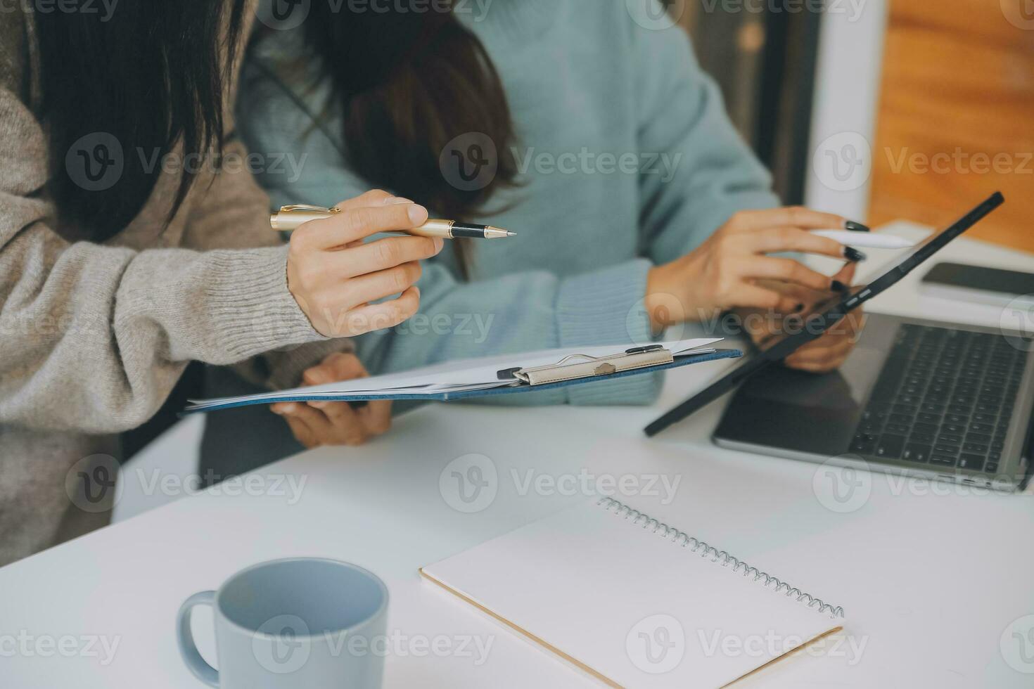 Co working conference, Business team meeting present, investor colleagues discussing new plan financial graph data on office table with laptop and digital tablet, Finance, accounting, investment. photo