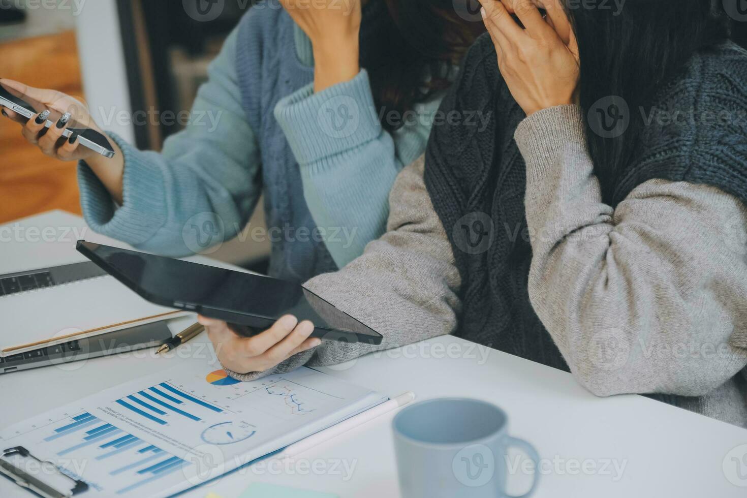 Co working conference, Business team meeting present, investor colleagues discussing new plan financial graph data on office table with laptop and digital tablet, Finance, accounting, investment. photo