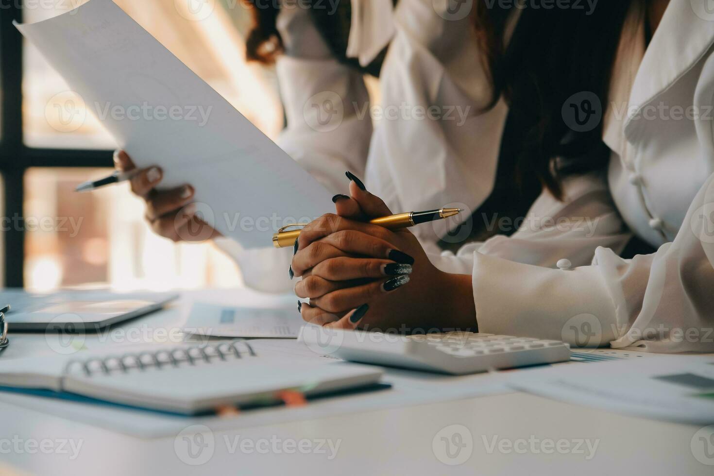 Business team collaboration discussing working analyzing with financial data and marketing growth report graph in team, presentation and brainstorming to strategy planning making profit of company. photo