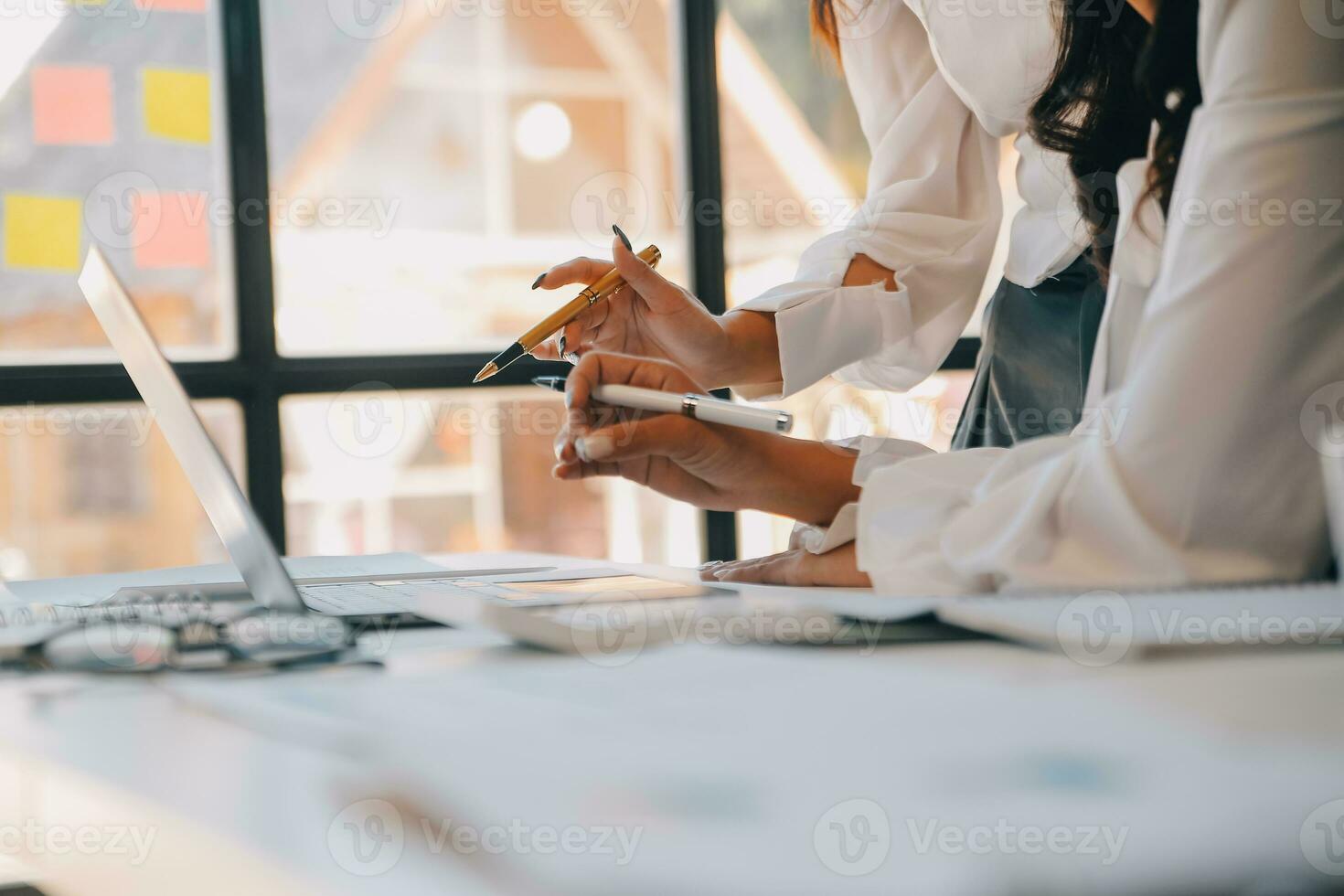 Business team collaboration discussing working analyzing with financial data and marketing growth report graph in team, presentation and brainstorming to strategy planning making profit of company. photo