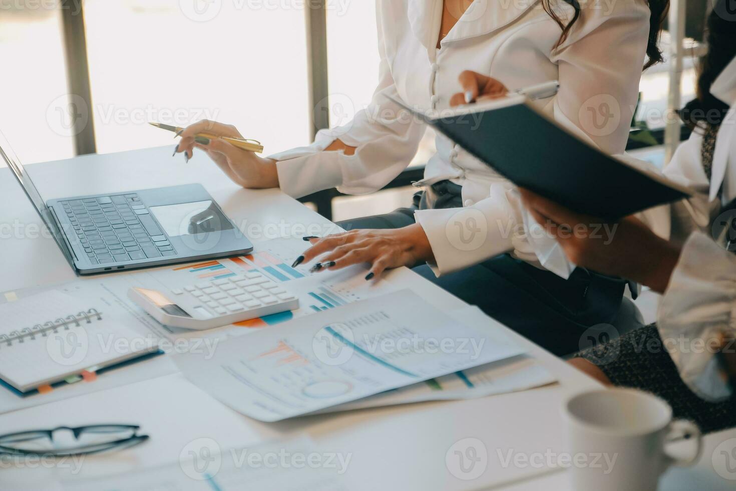Business team collaboration discussing working analyzing with financial data and marketing growth report graph in team, presentation and brainstorming to strategy planning making profit of company. photo