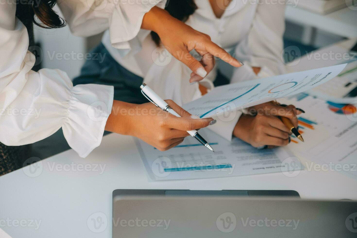 Business team collaboration discussing working analyzing with financial data and marketing growth report graph in team, presentation and brainstorming to strategy planning making profit of company. photo