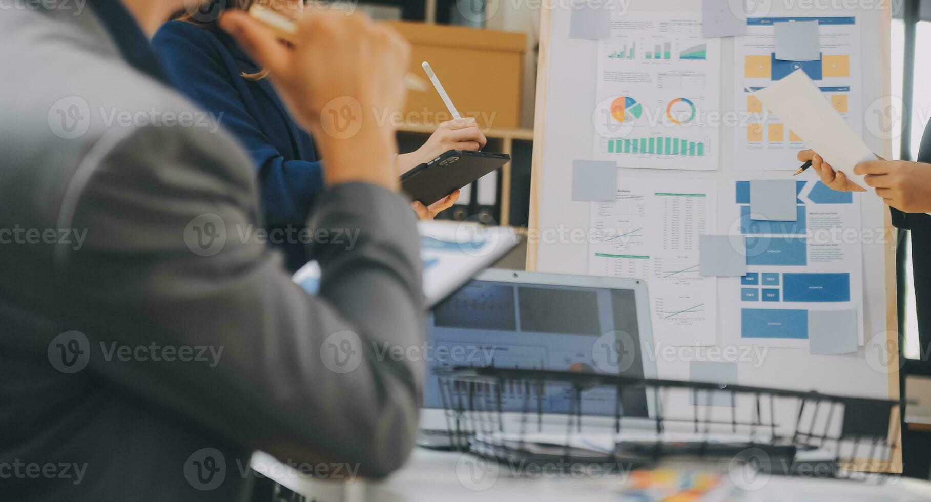 Close up ux developer and ui designer use augmented reality brainstorming about mobile app interface wireframe design on desk at modern office.Creative digital development agency photo