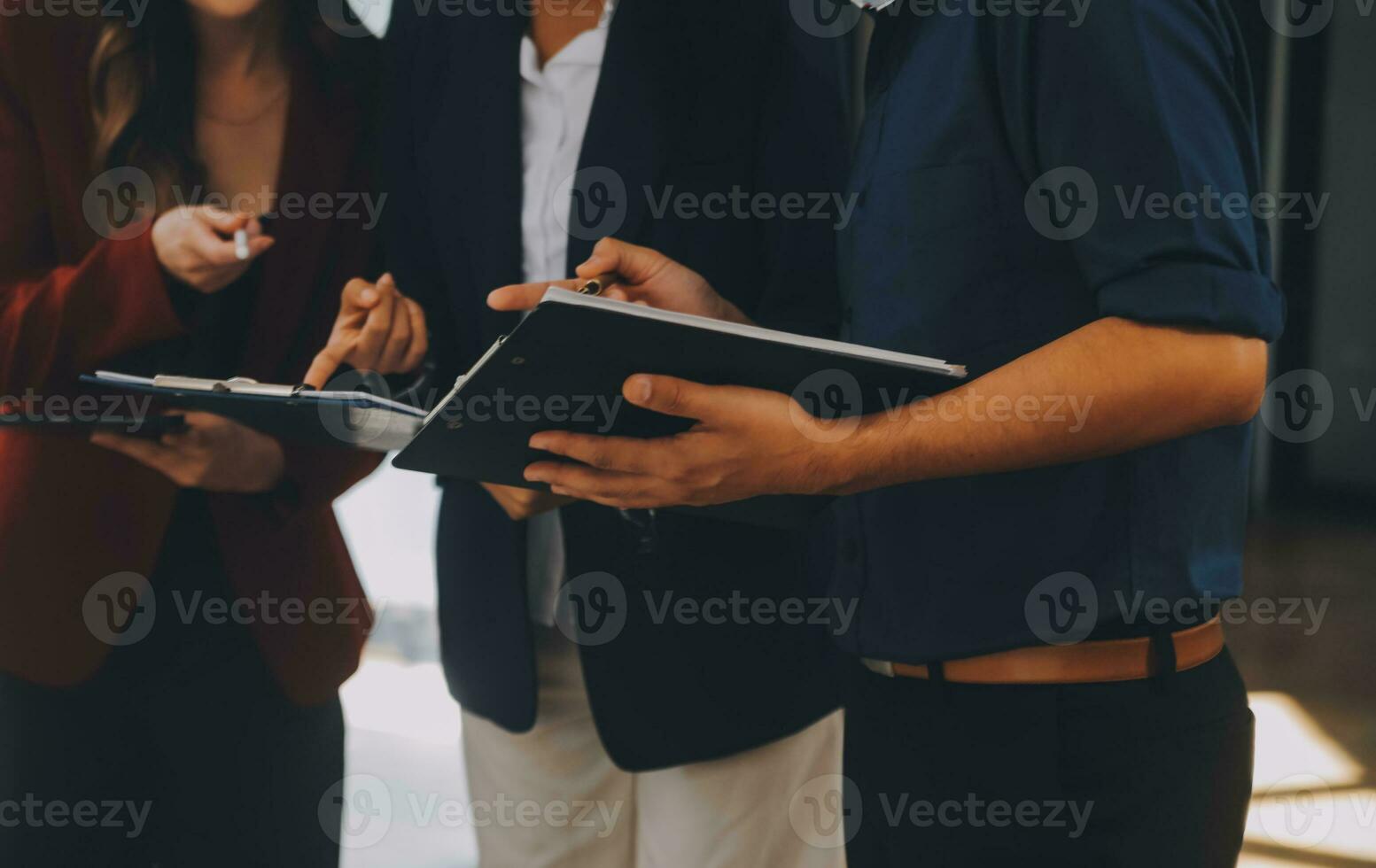 Group of Young Asian business team creative businesspeople coworker in office Happy to be successful partnership teamwork celebrating achievement and success concept. photo
