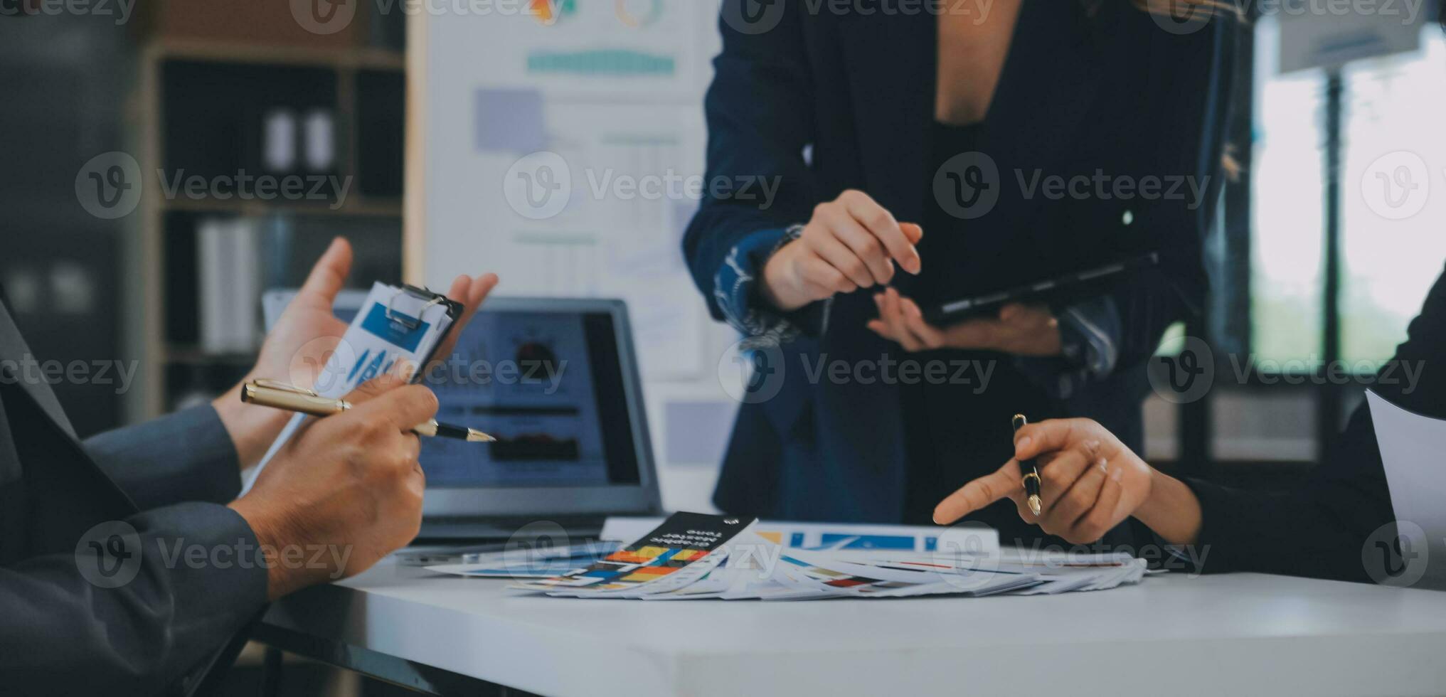 Close up ux developer and ui designer use augmented reality brainstorming about mobile app interface wireframe design on desk at modern office.Creative digital development agency photo