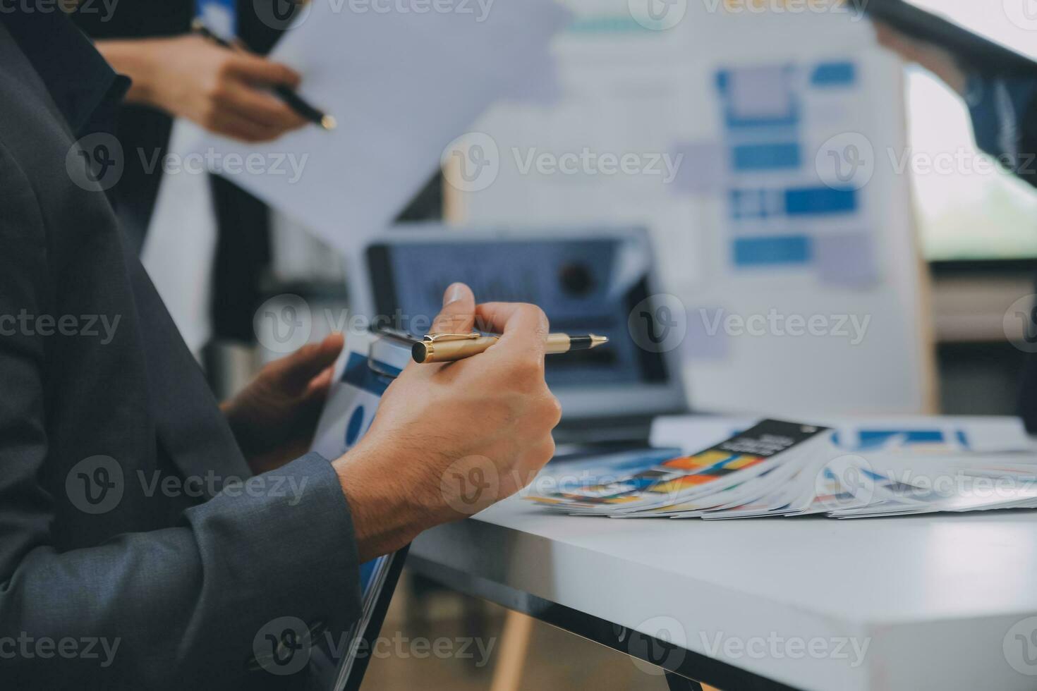 Close up ux developer and ui designer use augmented reality brainstorming about mobile app interface wireframe design on desk at modern office.Creative digital development agency photo