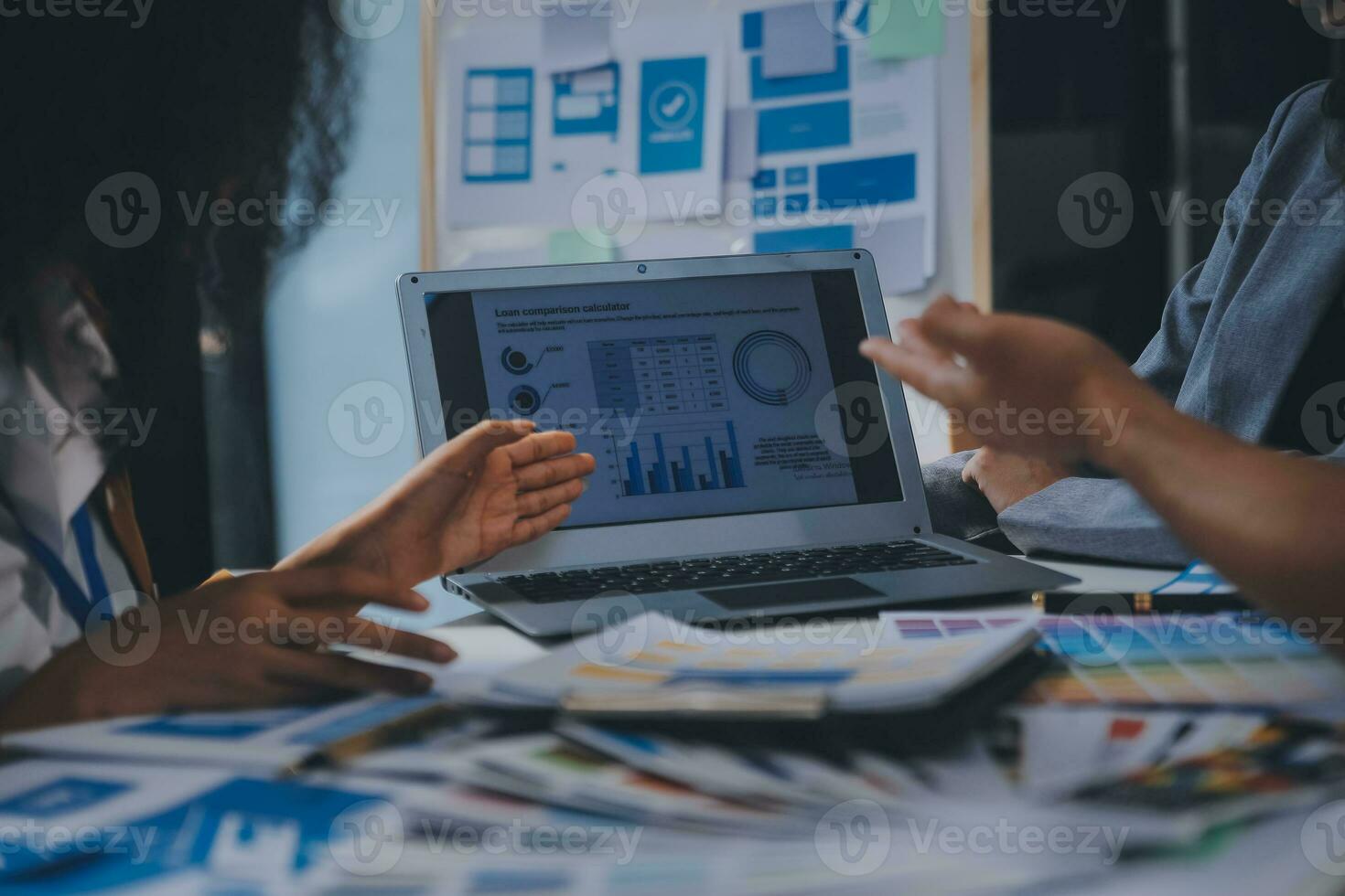 Close up ux developer and ui designer use augmented reality brainstorming about mobile app interface wireframe design on desk at modern office.Creative digital development agency photo