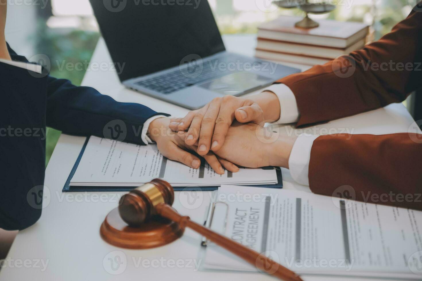 Lawyer, legal advisor, businessman brainstorming information on agreement details Business contracts in legal processing books for accuracy in contract documents. joint financial investment. photo
