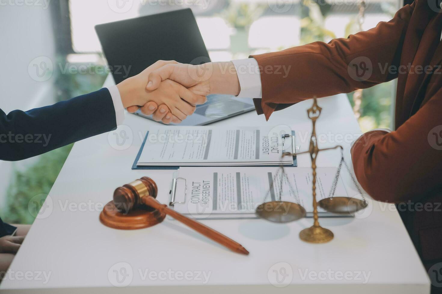 Lawyer, legal advisor, businessman brainstorming information on agreement details Business contracts in legal processing books for accuracy in contract documents. joint financial investment. photo