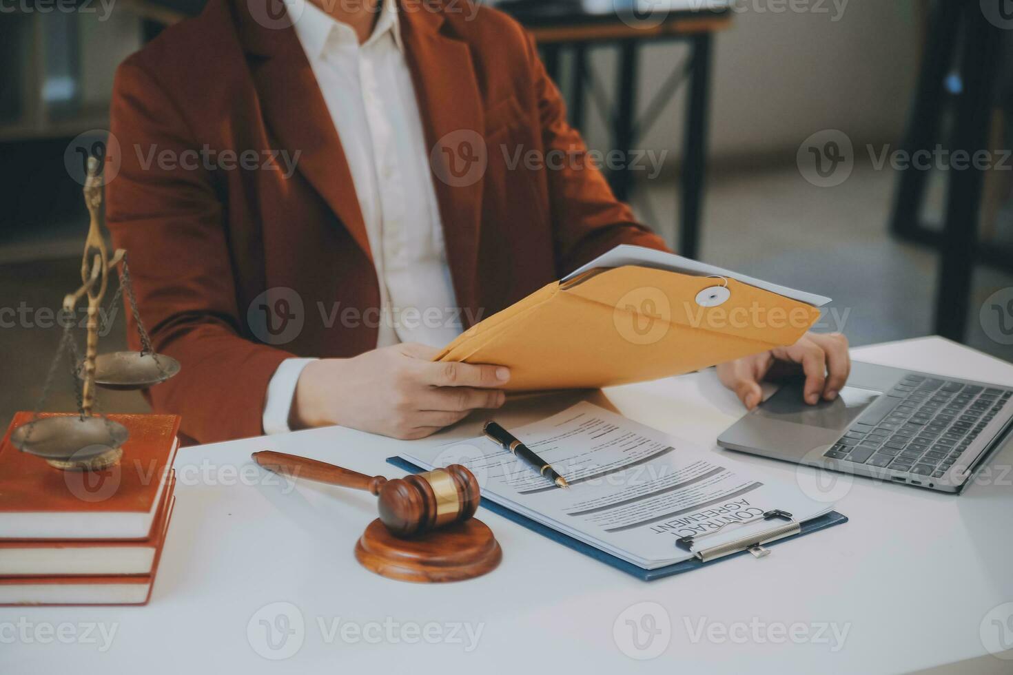 Lawyer, legal advisor, businessman brainstorming information on agreement details Business contracts in legal processing books for accuracy in contract documents. joint financial investment. photo