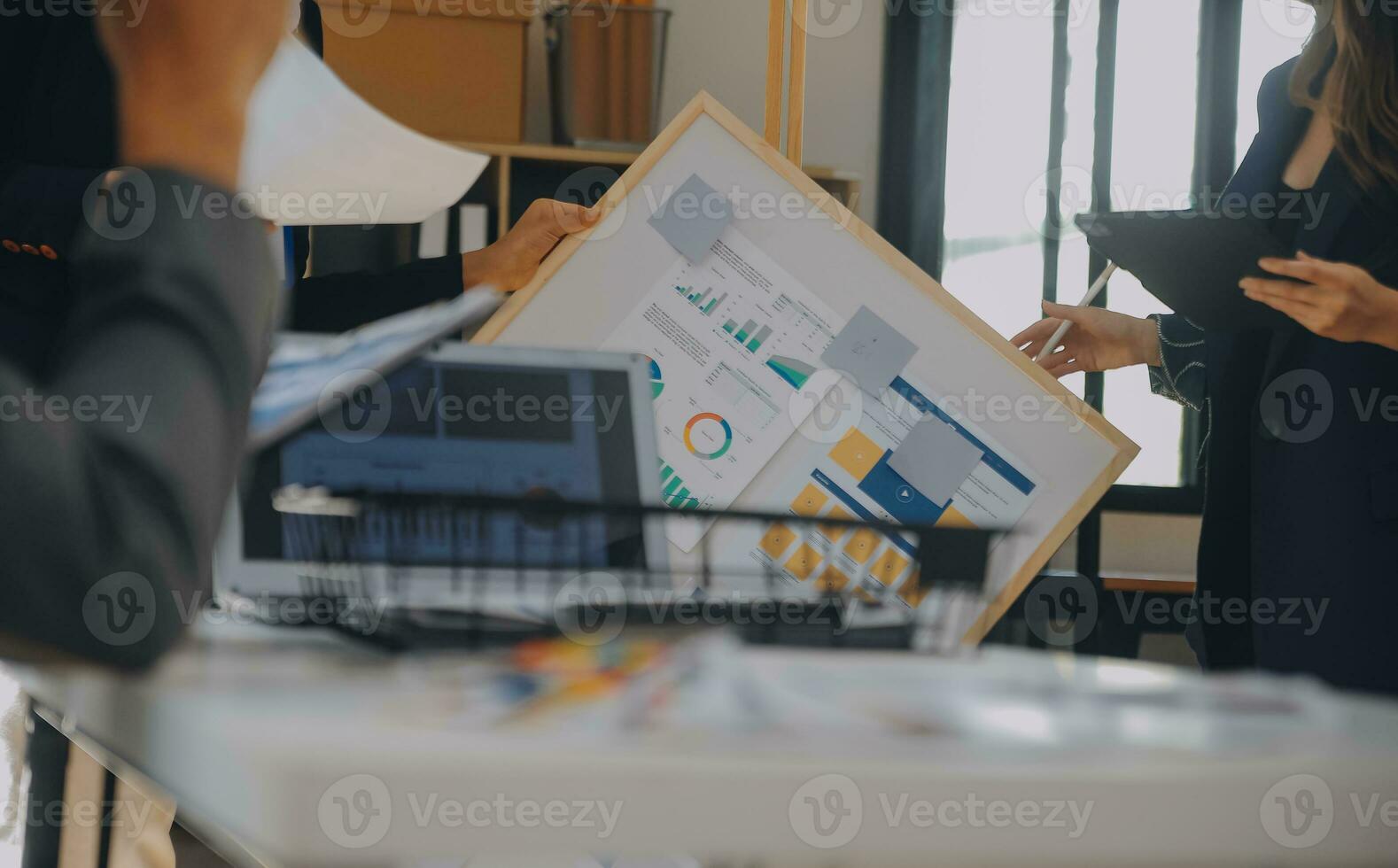 Close up ux developer and ui designer use augmented reality brainstorming about mobile app interface wireframe design on desk at modern office.Creative digital development agency photo