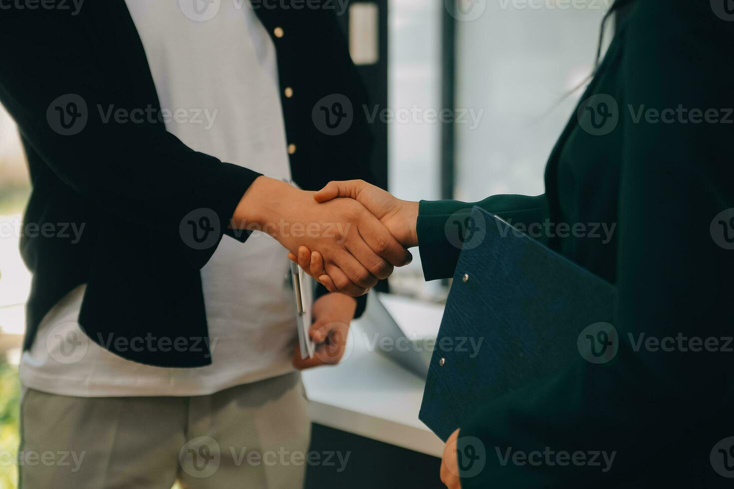 Businessmen join hands at the meeting to congratulate the company's big project on its success and its financial results have made a huge profit for the company, Finance concept. photo