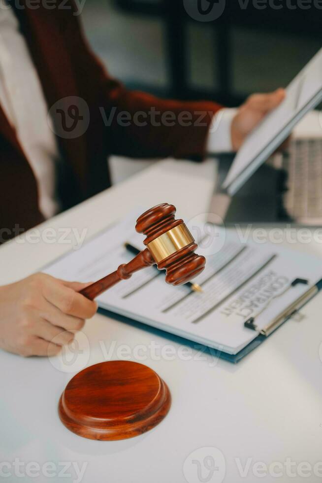 Lawyer, legal advisor, businessman brainstorming information on agreement details Business contracts in legal processing books for accuracy in contract documents. joint financial investment. photo