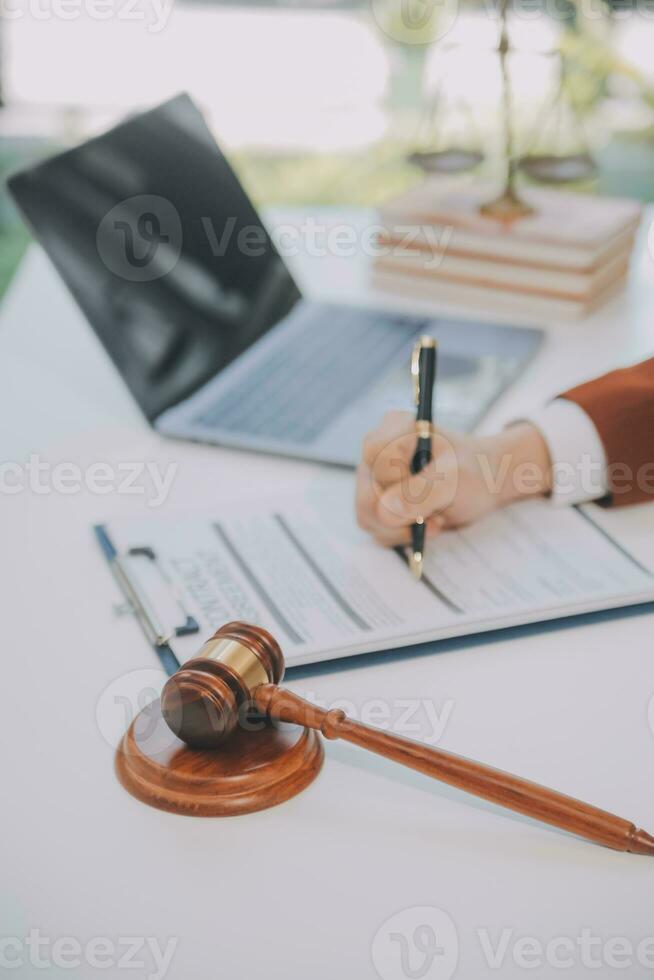 Lawyer, legal advisor, businessman brainstorming information on agreement details Business contracts in legal processing books for accuracy in contract documents. joint financial investment. photo