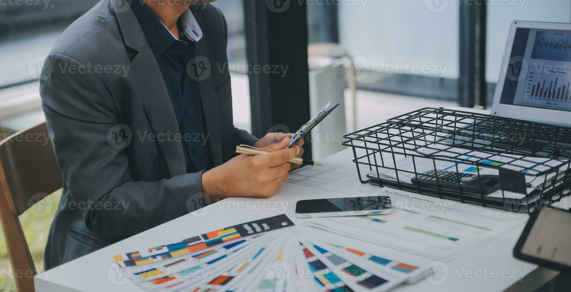 Close up ux developer and ui designer use augmented reality brainstorming about mobile app interface wireframe design on desk at modern office.Creative digital development agency photo