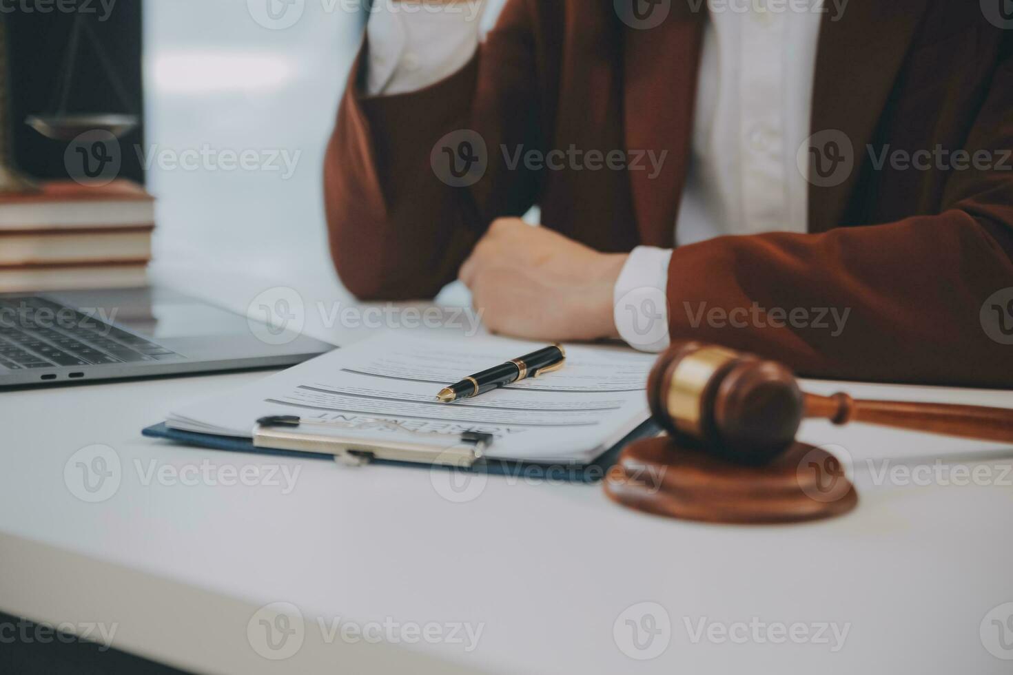 Lawyer, legal advisor, businessman brainstorming information on agreement details Business contracts in legal processing books for accuracy in contract documents. joint financial investment. photo