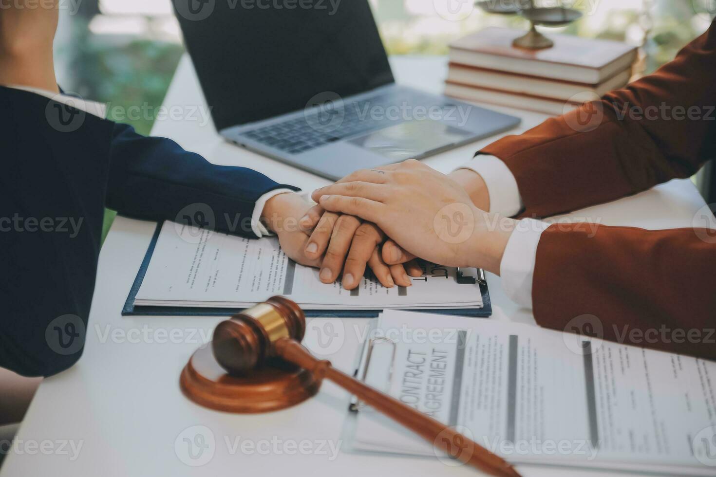 Lawyer, legal advisor, businessman brainstorming information on agreement details Business contracts in legal processing books for accuracy in contract documents. joint financial investment. photo