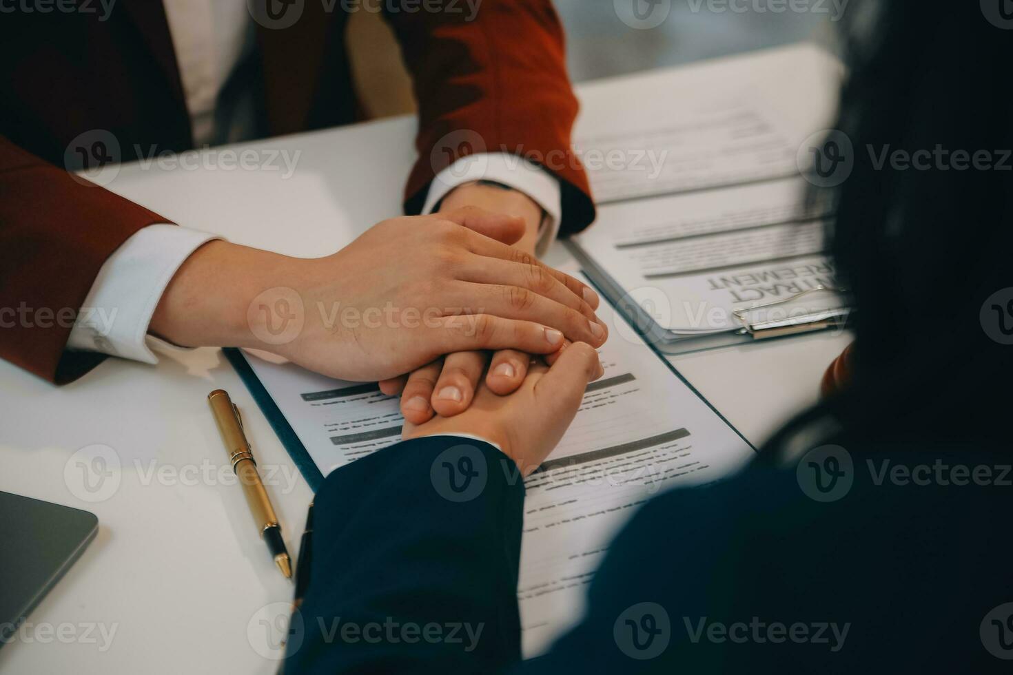 Lawyer, legal advisor, businessman brainstorming information on agreement details Business contracts in legal processing books for accuracy in contract documents. joint financial investment. photo