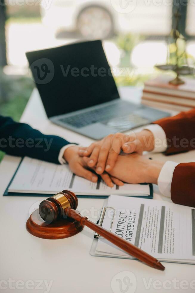Lawyer, legal advisor, businessman brainstorming information on agreement details Business contracts in legal processing books for accuracy in contract documents. joint financial investment. photo
