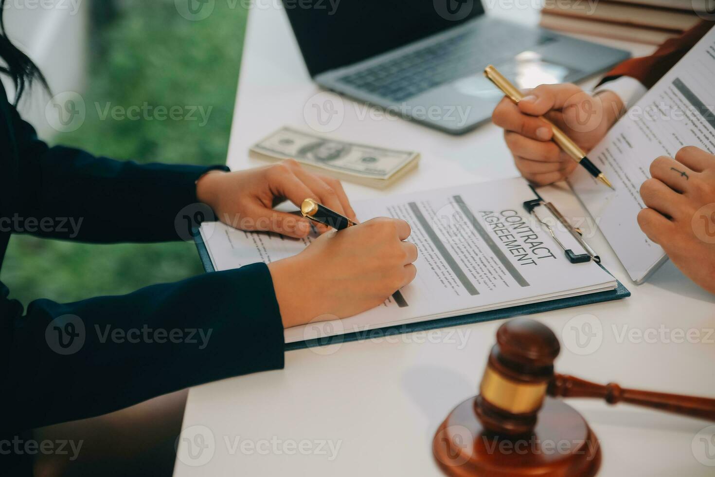 Lawyer, legal advisor, businessman brainstorming information on agreement details Business contracts in legal processing books for accuracy in contract documents. joint financial investment. photo