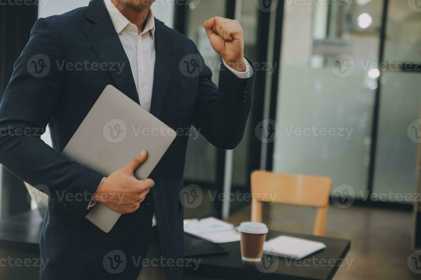Financial analysts analyze business financial reports on a digital tablet planning investment project during a discussion at a meeting of corporate showing the results of their successful teamwork. photo