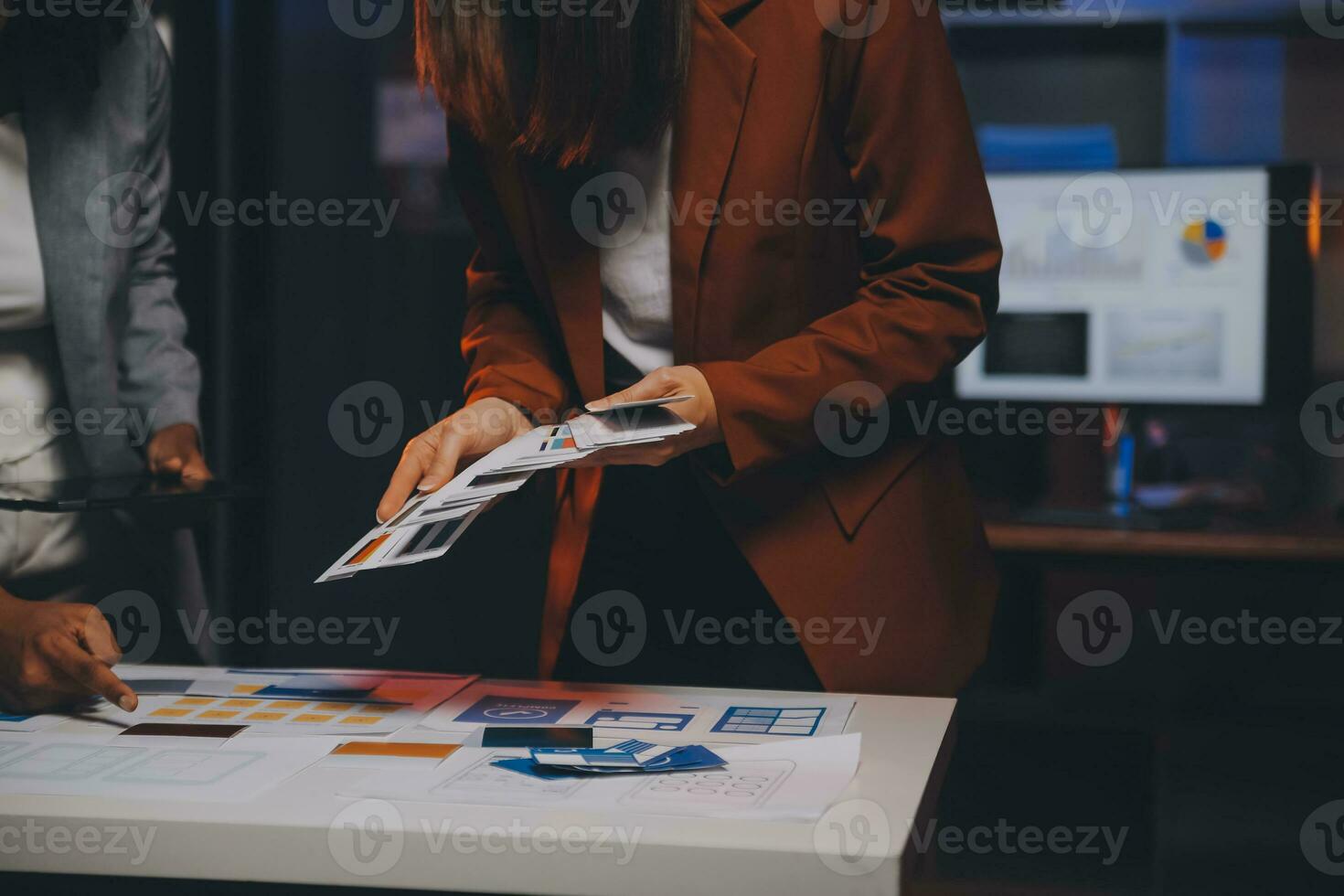 team of UI UX web designer are working together to develop mobile responsive websites. Mobile Mockup photo