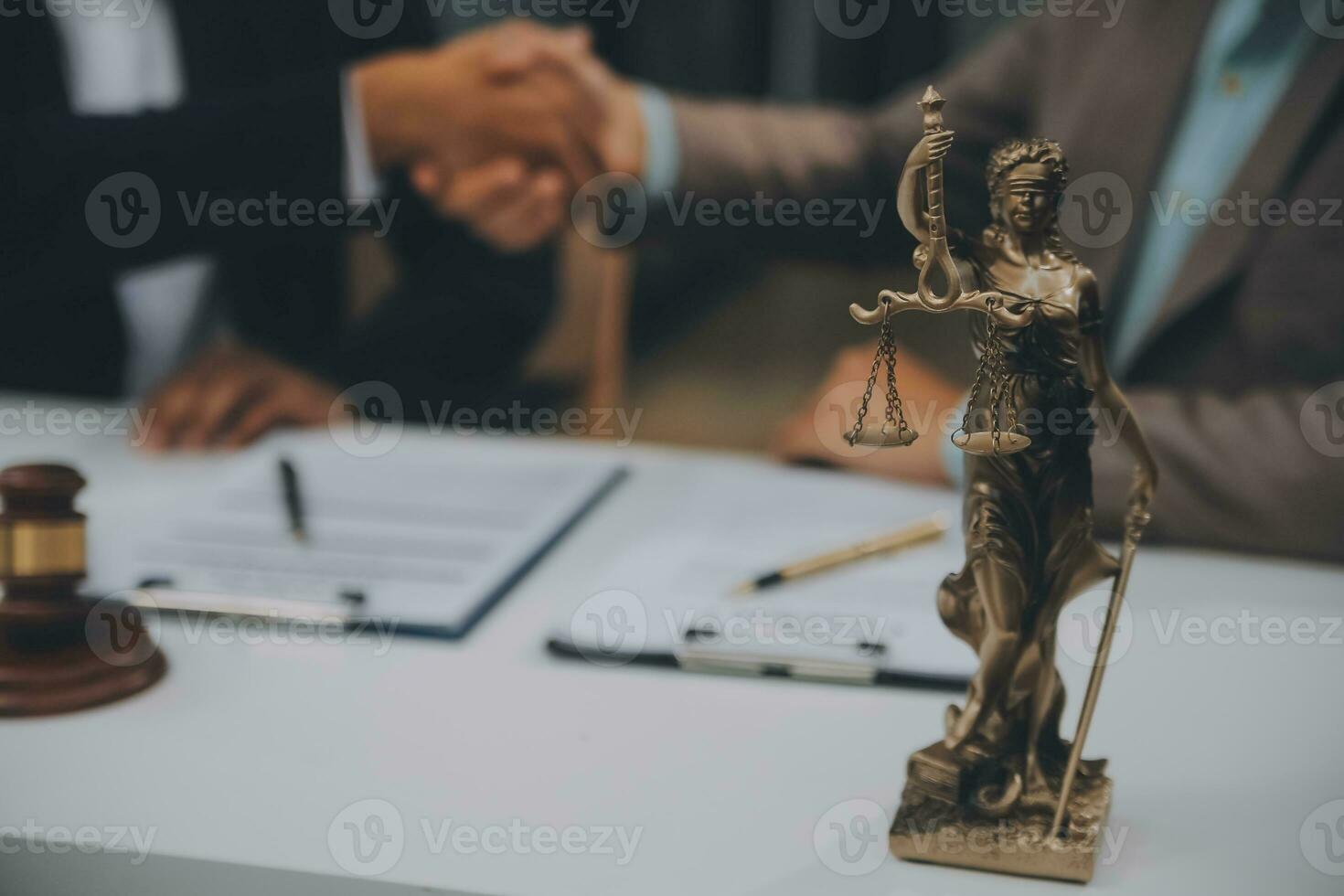 Business and lawyers discussing contract papers with brass scale on desk in office. Law, legal services, advice, justice and law concept picture with film grain effect photo