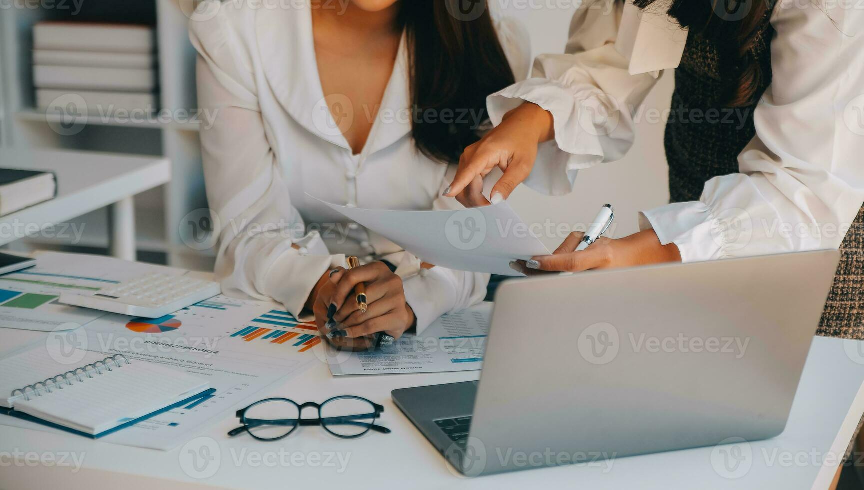 Business team collaboration discussing working analyzing with financial data and marketing growth report graph in team, presentation and brainstorming to strategy planning making profit of company. photo