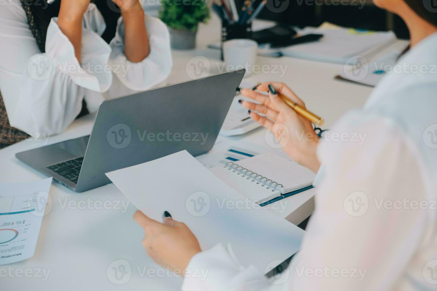 Business team collaboration discussing working analyzing with financial data and marketing growth report graph in team, presentation and brainstorming to strategy planning making profit of company. photo