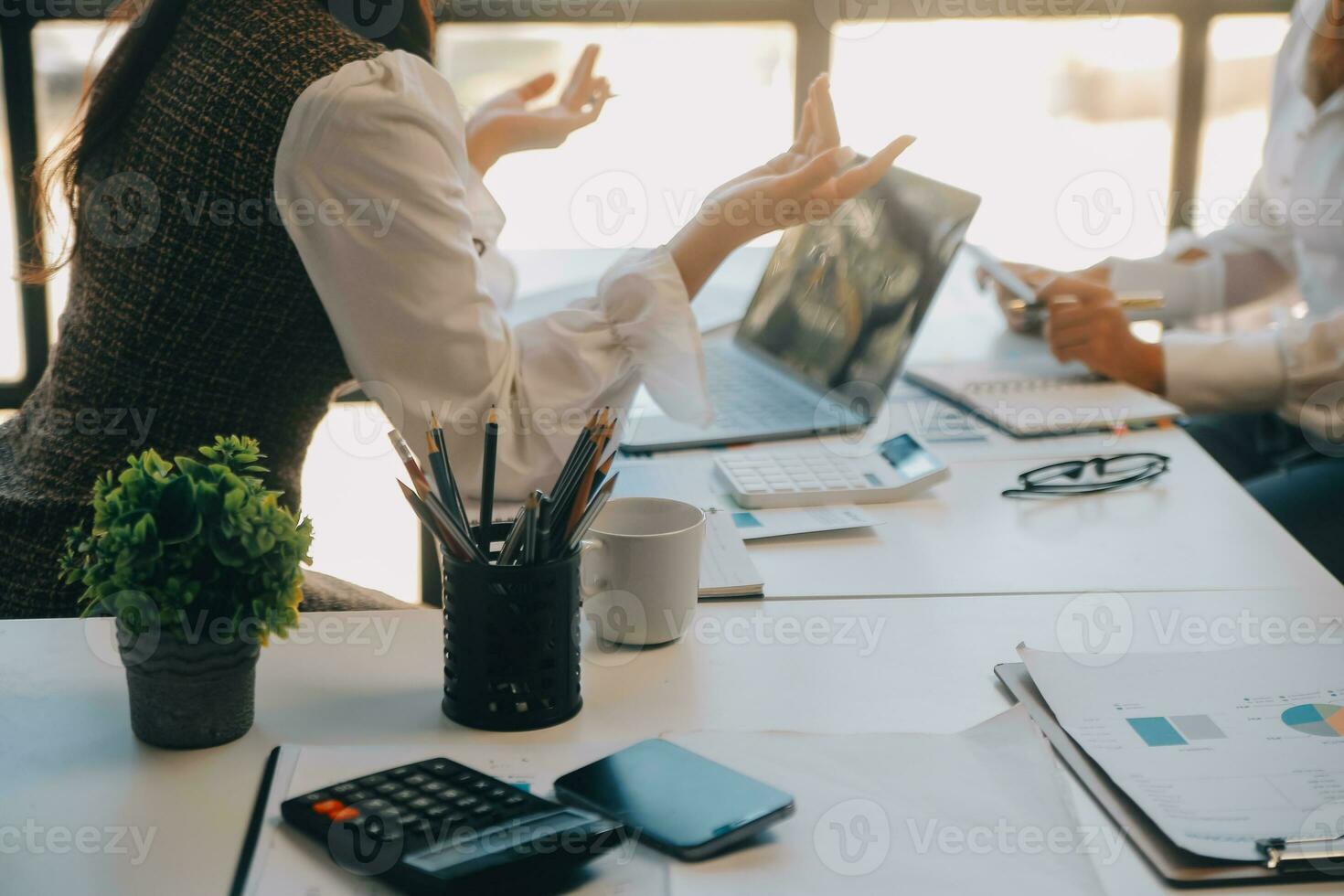 Business team collaboration discussing working analyzing with financial data and marketing growth report graph in team, presentation and brainstorming to strategy planning making profit of company. photo