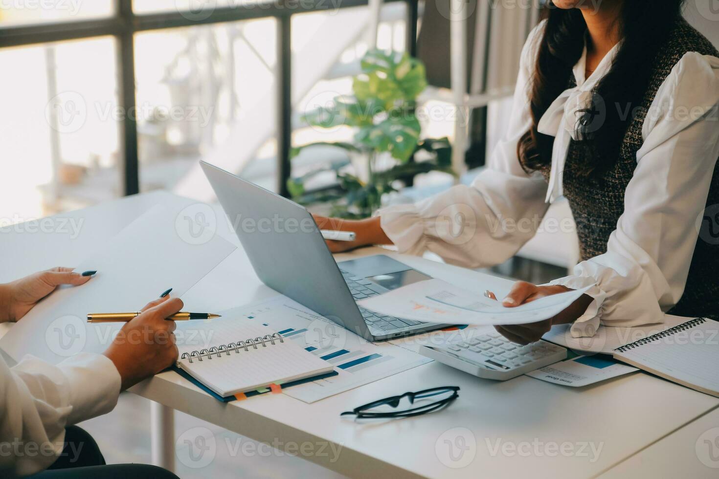 Business team collaboration discussing working analyzing with financial data and marketing growth report graph in team, presentation and brainstorming to strategy planning making profit of company. photo