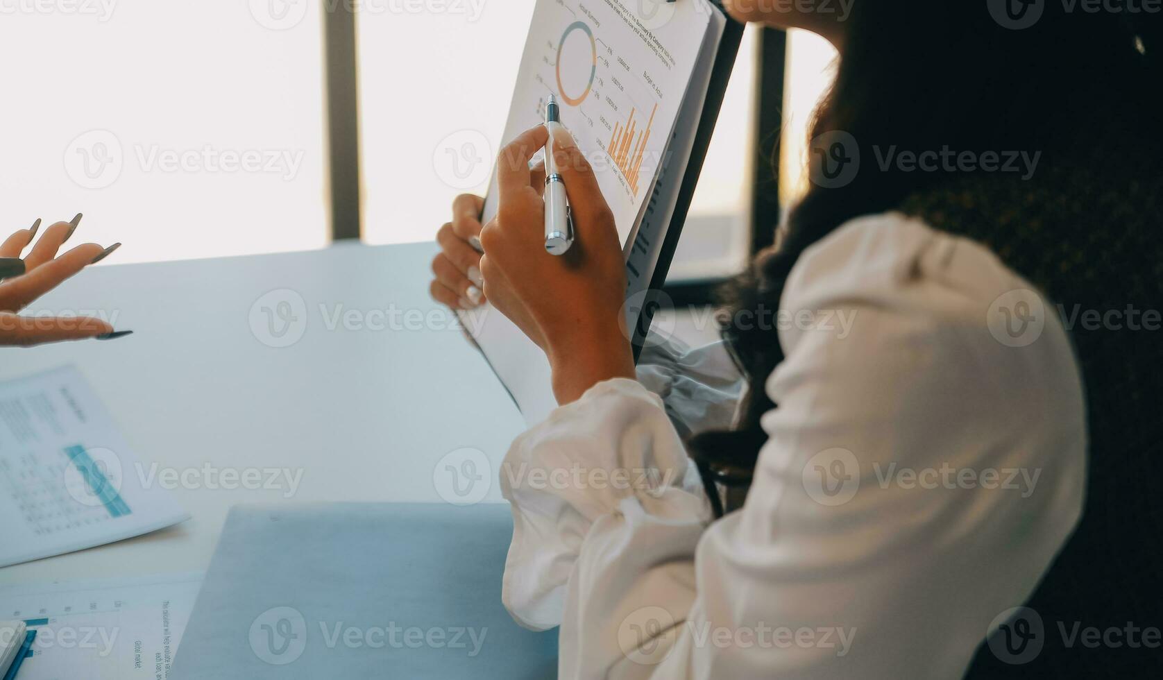Business team collaboration discussing working analyzing with financial data and marketing growth report graph in team, presentation and brainstorming to strategy planning making profit of company. photo
