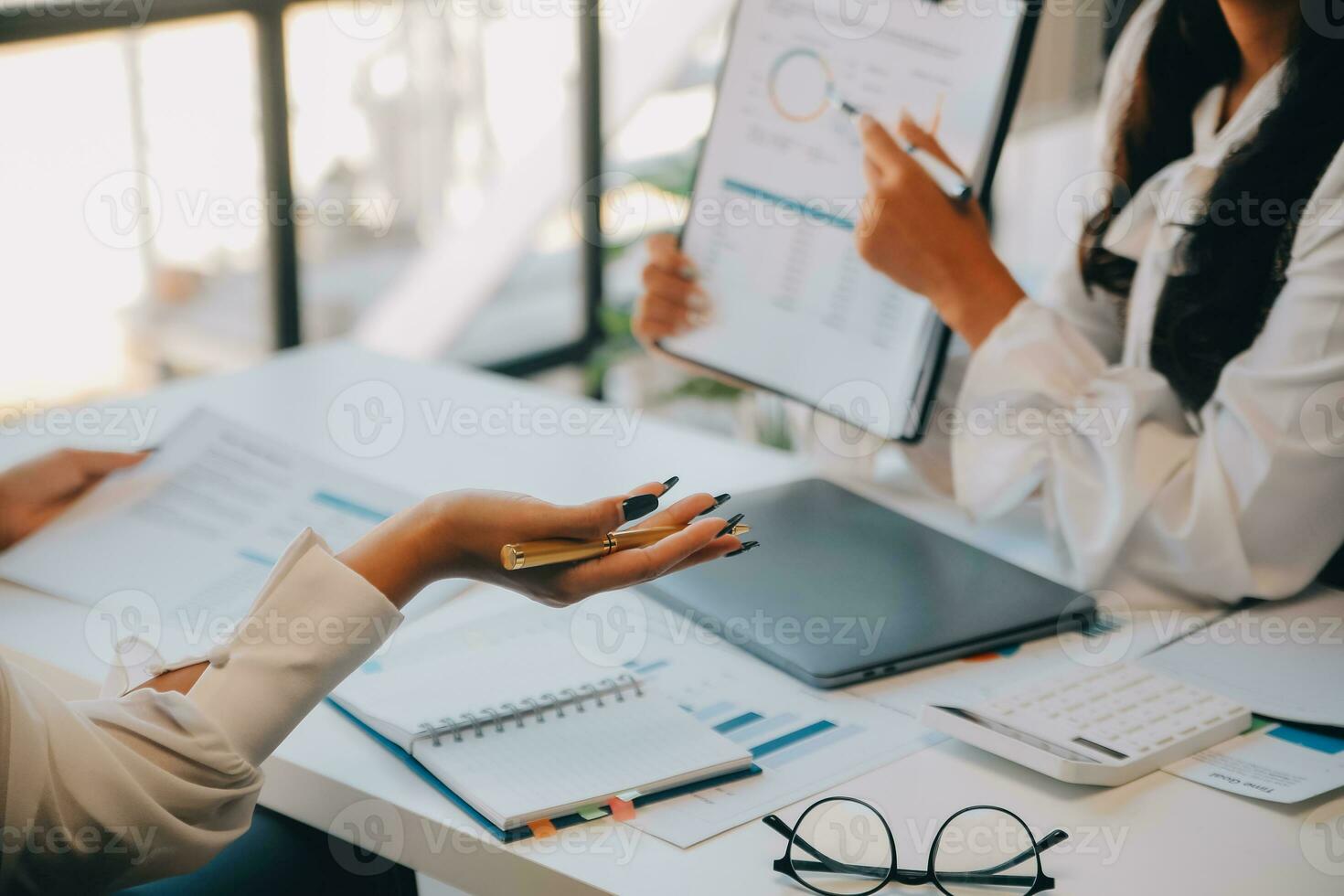 Business team collaboration discussing working analyzing with financial data and marketing growth report graph in team, presentation and brainstorming to strategy planning making profit of company. photo