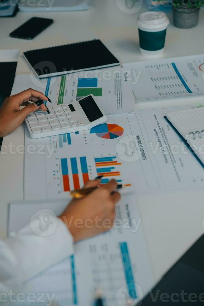 Business team collaboration discussing working analyzing with financial data and marketing growth report graph in team, presentation and brainstorming to strategy planning making profit of company. photo