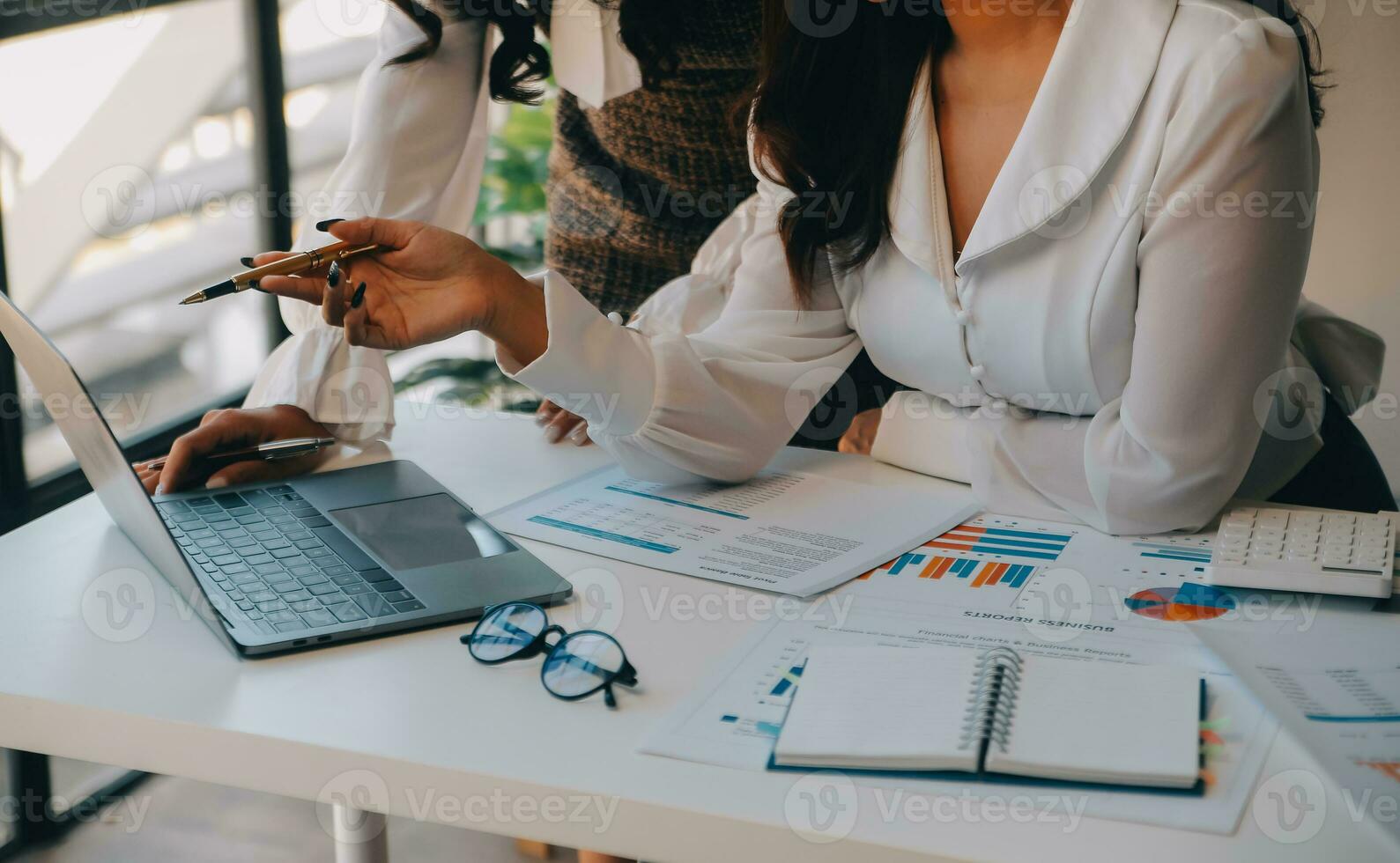 Business team collaboration discussing working analyzing with financial data and marketing growth report graph in team, presentation and brainstorming to strategy planning making profit of company. photo