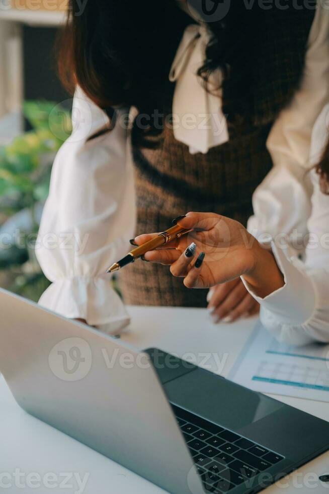 Business team collaboration discussing working analyzing with financial data and marketing growth report graph in team, presentation and brainstorming to strategy planning making profit of company. photo