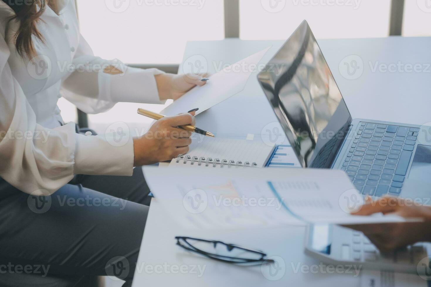 Business team collaboration discussing working analyzing with financial data and marketing growth report graph in team, presentation and brainstorming to strategy planning making profit of company. photo
