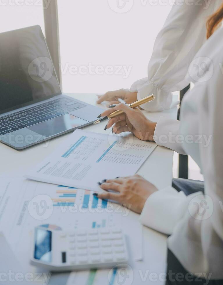 Business team collaboration discussing working analyzing with financial data and marketing growth report graph in team, presentation and brainstorming to strategy planning making profit of company. photo