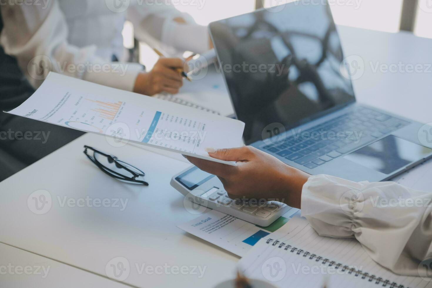 Business team collaboration discussing working analyzing with financial data and marketing growth report graph in team, presentation and brainstorming to strategy planning making profit of company. photo