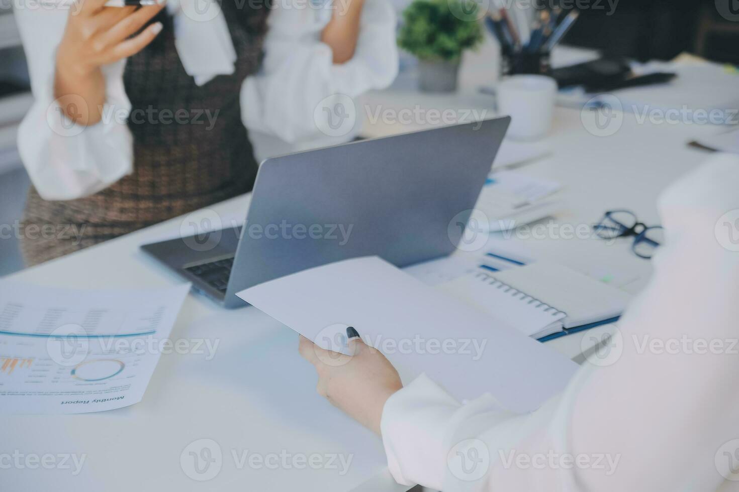Business team collaboration discussing working analyzing with financial data and marketing growth report graph in team, presentation and brainstorming to strategy planning making profit of company. photo