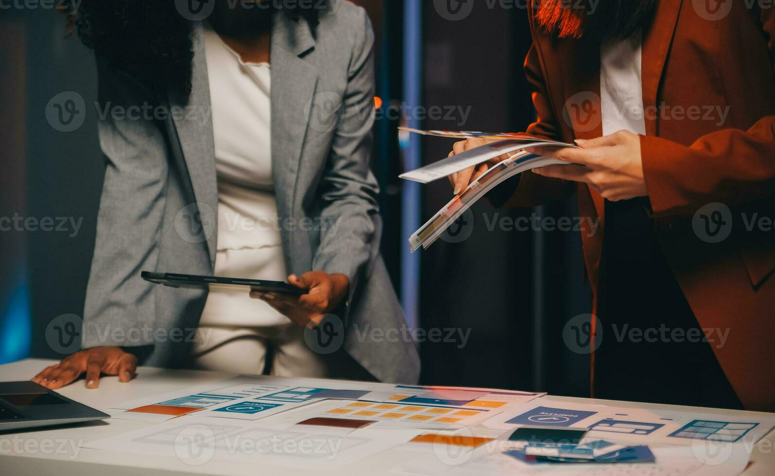 team of UI UX web designer are working together to develop mobile responsive websites. Mobile Mockup photo