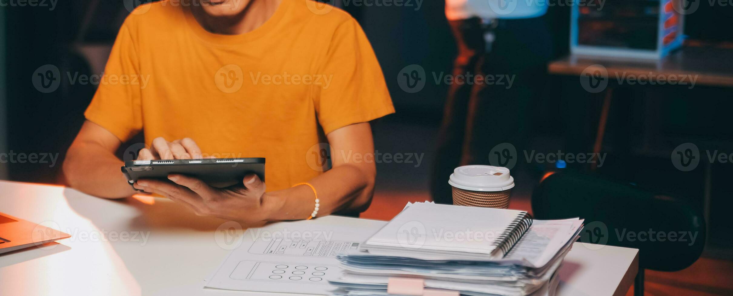 Website designer, Creative planning phone app development template layout framework wireframe design, User experience concept, Young asian man UX designer working on smartphone application at office photo